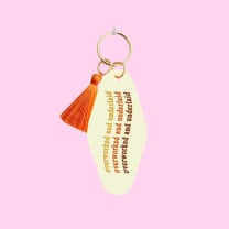 Fun Club Overworked And Underlaid Keychain with Orange Tassel