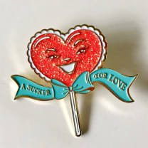 A Sucker For Love Soft Enamel Pin | Heart-Shaped Lollipop with Red Glitter