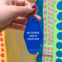 My Other Car Is Your Dad Motel Keychain in Blue