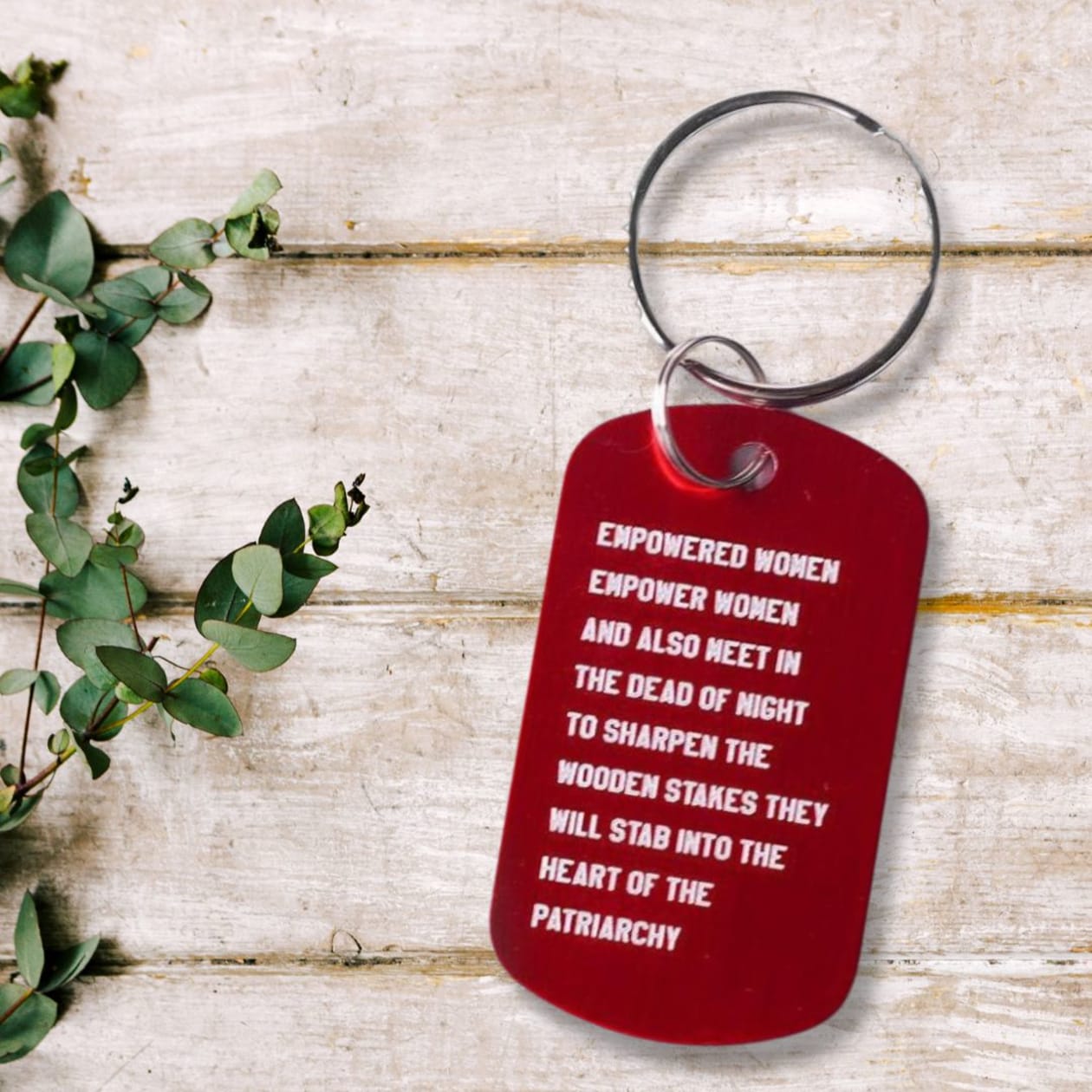 Empowered Women Empower Women And Also Meet in the Dead of Night Feminist Dog Tag Keychain in Red with Silver Lettering