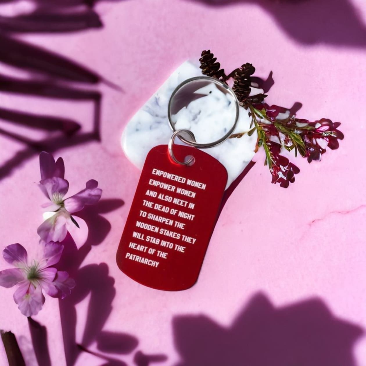 Empowered Women Empower Women And Also Meet in the Dead of Night Feminist Dog Tag Keychain in Red with Silver Lettering