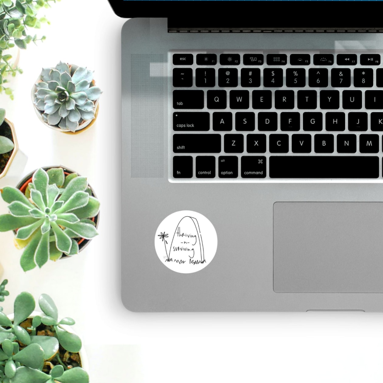 Thriving -n- Surviving Round Sticker | Durable Vinyl for Laptop, Car, Bike, Etc.