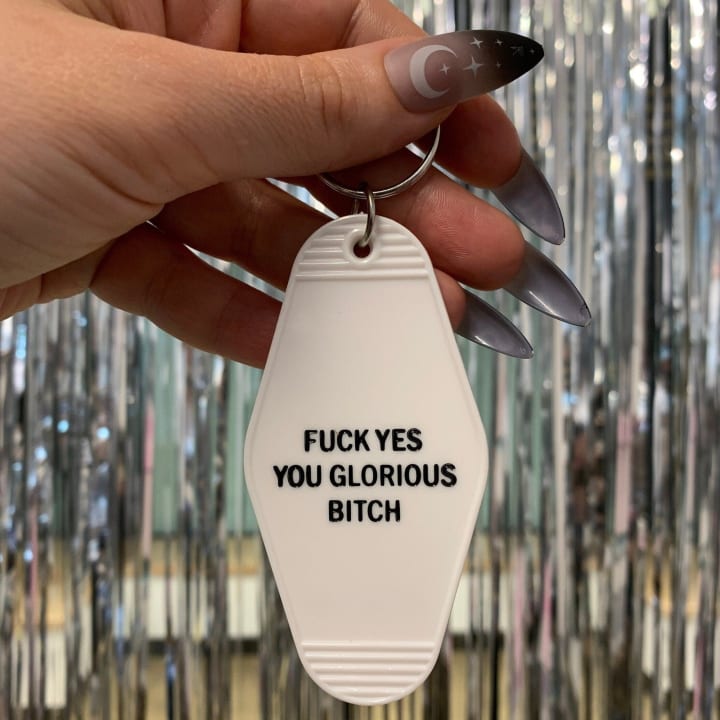 Fuck Yes You Glorious Bitch Motel Style Keychain in White