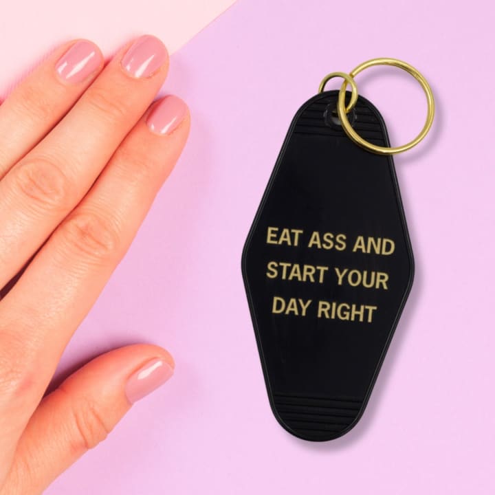 Eat Ass and Start Your Day Right Motel Style Keychain in Black and Gold