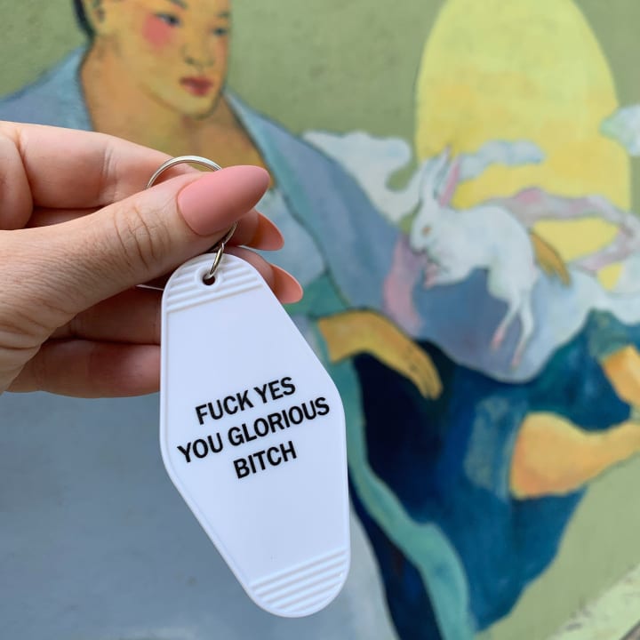 Fuck Yes You Glorious Bitch Motel Style Keychain in White