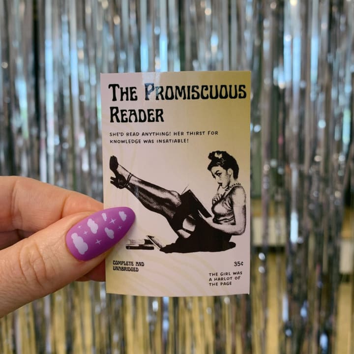 The Promiscuous Reader Glossy Die Cut Vinyl Sticker 1.96in x 2.95in