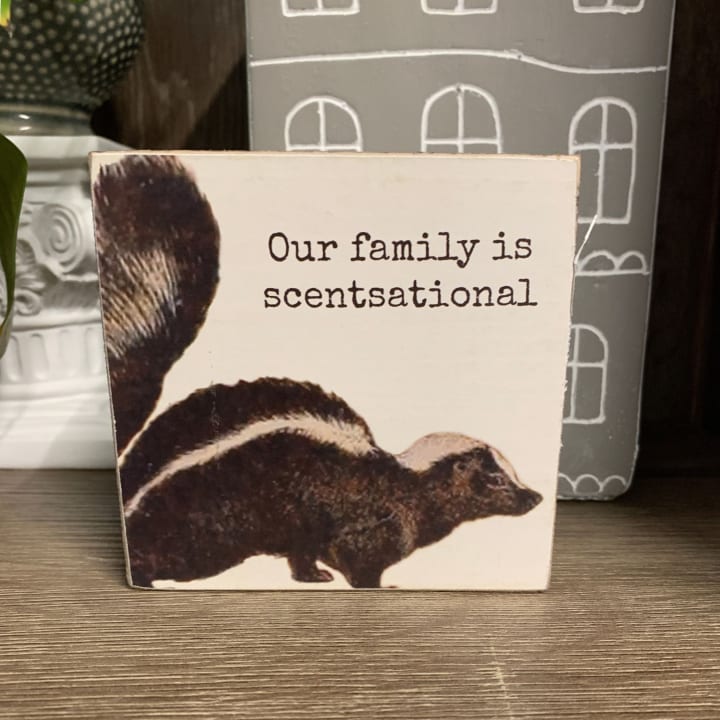Our Family Is Scentsational Skunk Motif Punny Wooden Block Sign | 4" x 4"