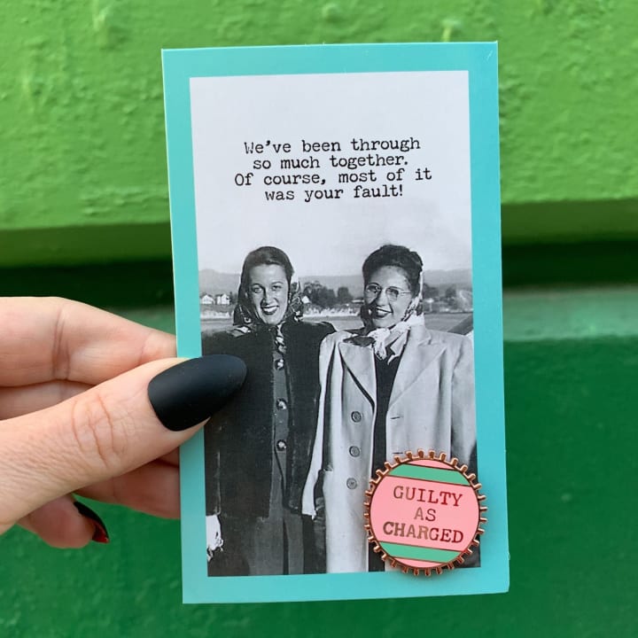 Guilty As Charged Pink and Mint Enamel Pin on Gift Card