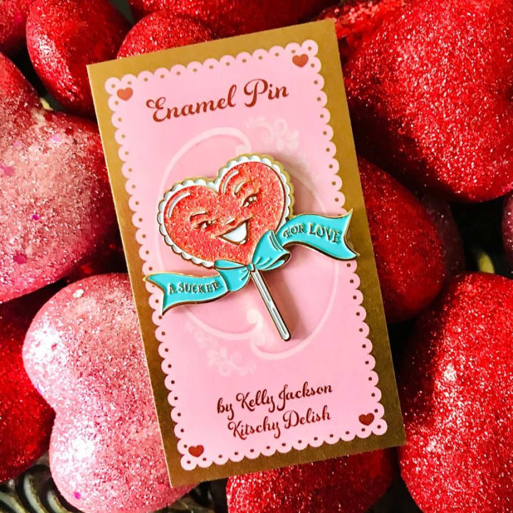 A Sucker For Love Soft Enamel Pin | Heart-Shaped Lollipop with Red Glitter