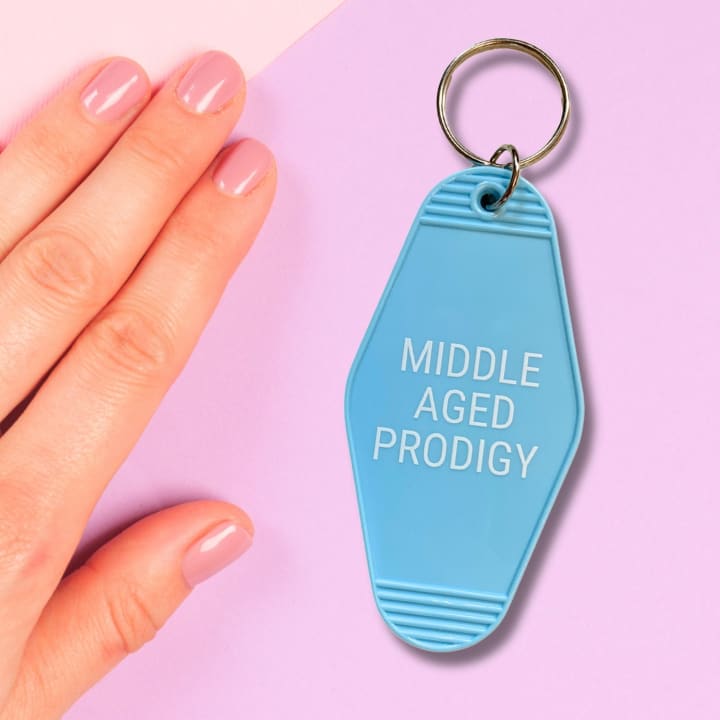 Middle Aged Prodigy Motel Style Keychain in Blue