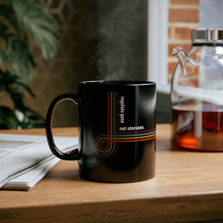 Regulate Guns Not Uteruses Pro-Choice Retro Rainbow Mug in Black