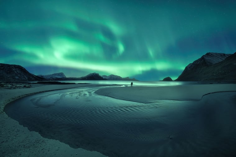 Watch the night sky turn trippy with the mysterious rays of the Northern Lights 