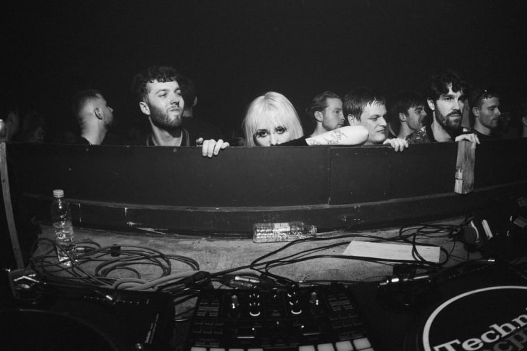 Black and white image of underground rave