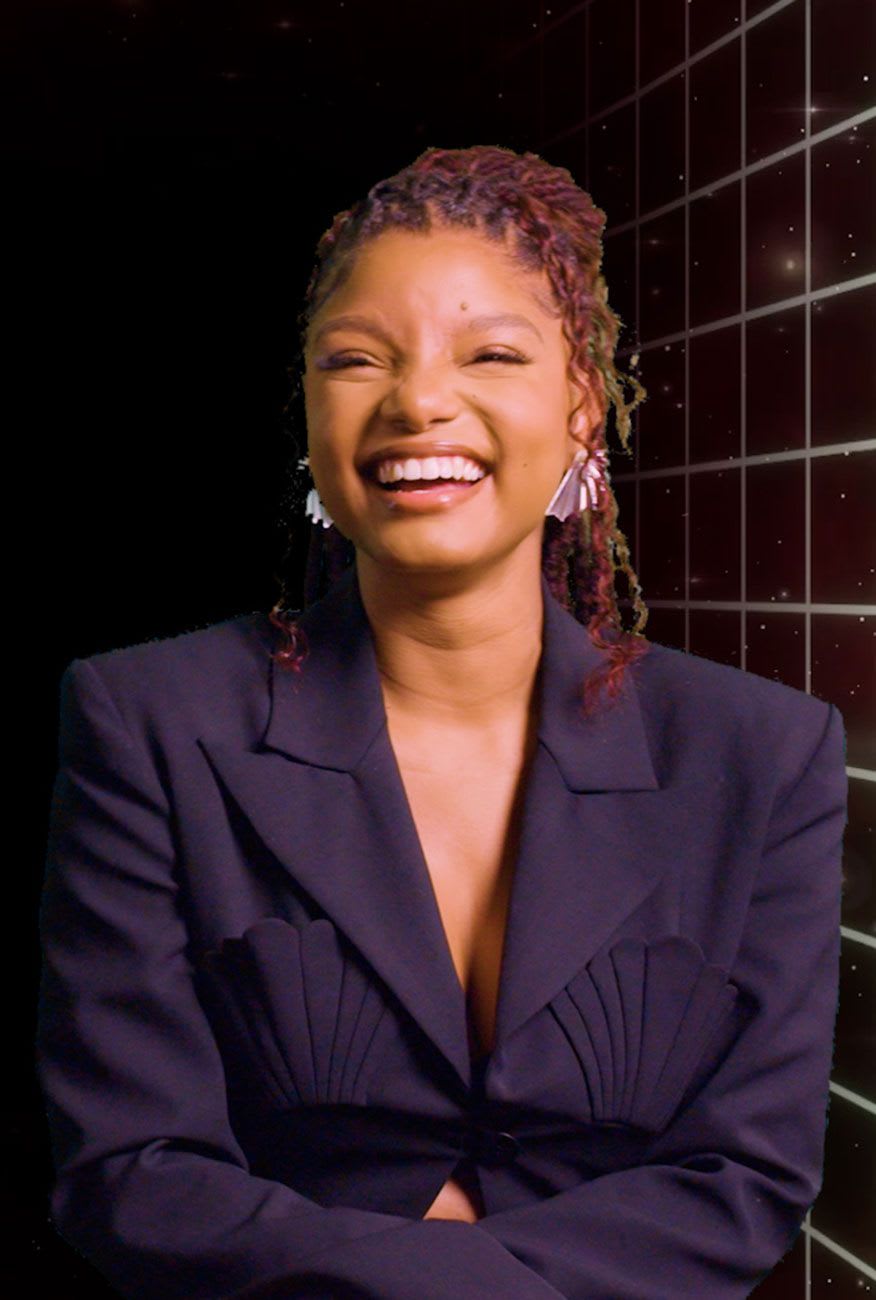 halle bailey black suit laughing
