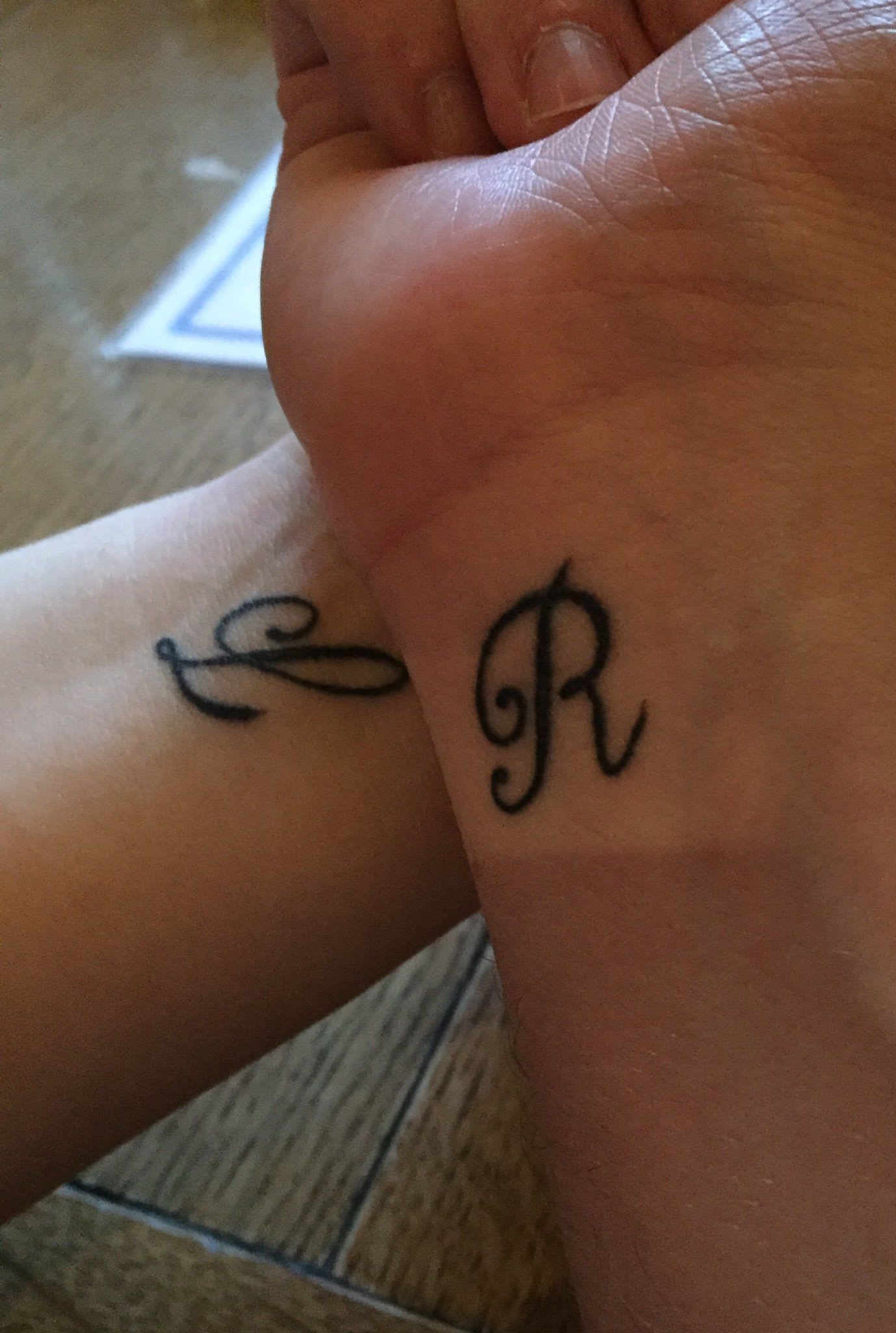 Matching friend tattoos