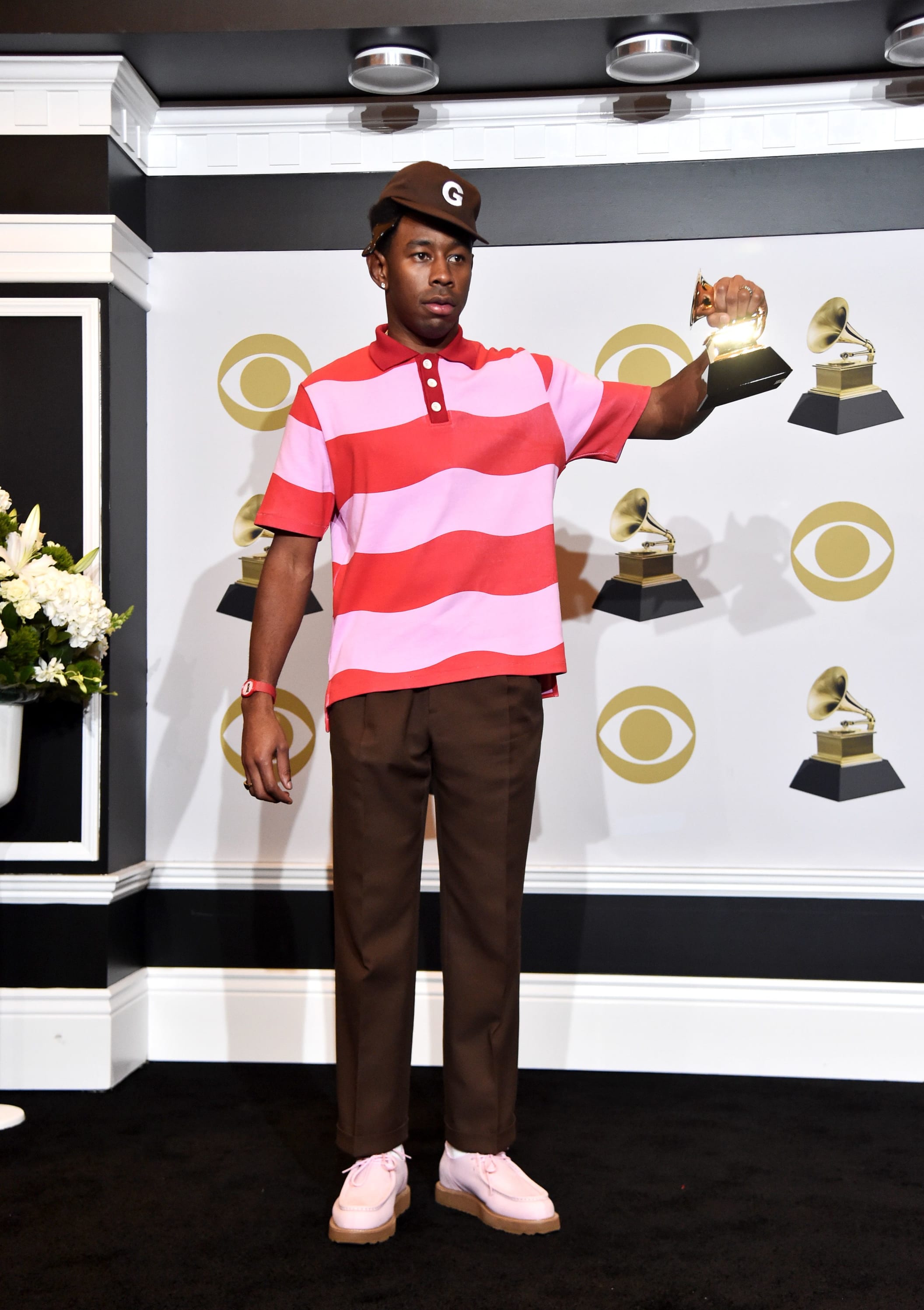 Tyler the Creator at the Grammys wearing Supreme Wool Overcoat, Louis  Vuitton Scarf & Converse Chuck Taylor All Star