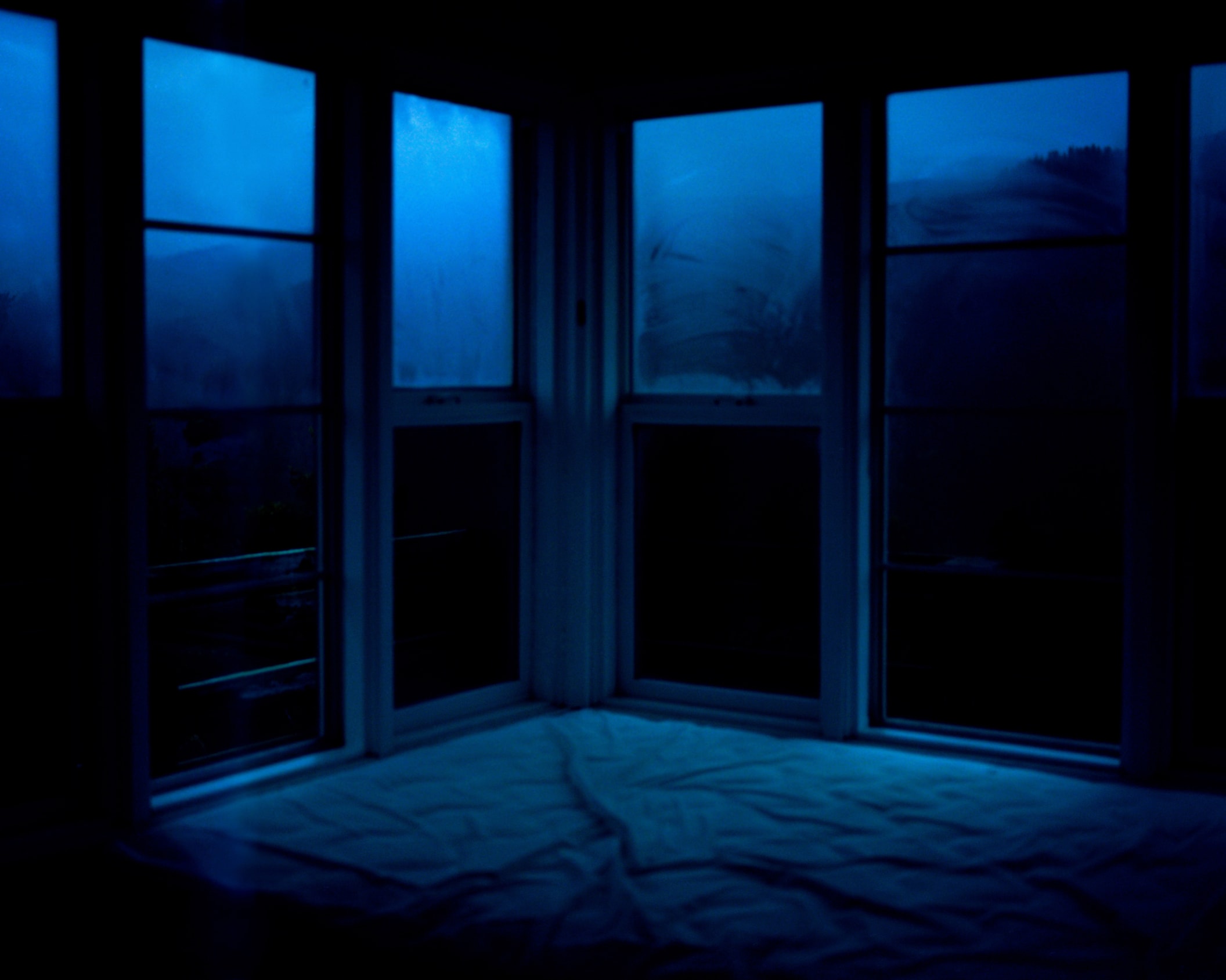 Cold and dark empty room with a stripped mattress - Caroline Tompkins' 'Bedfellow'