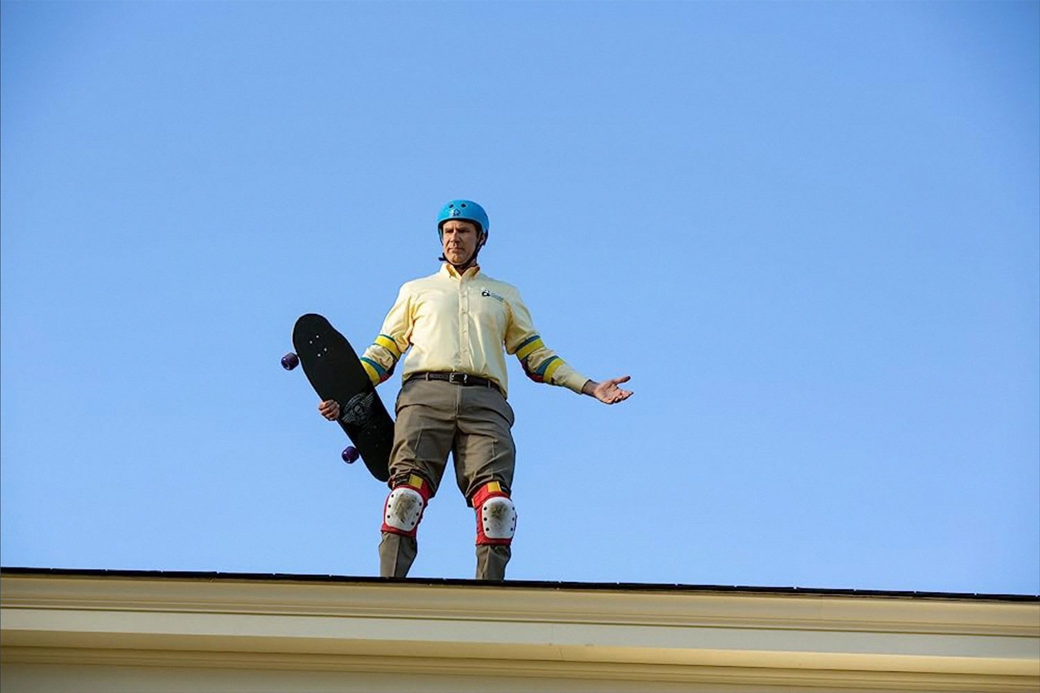 will ferrell on roof with skateboard